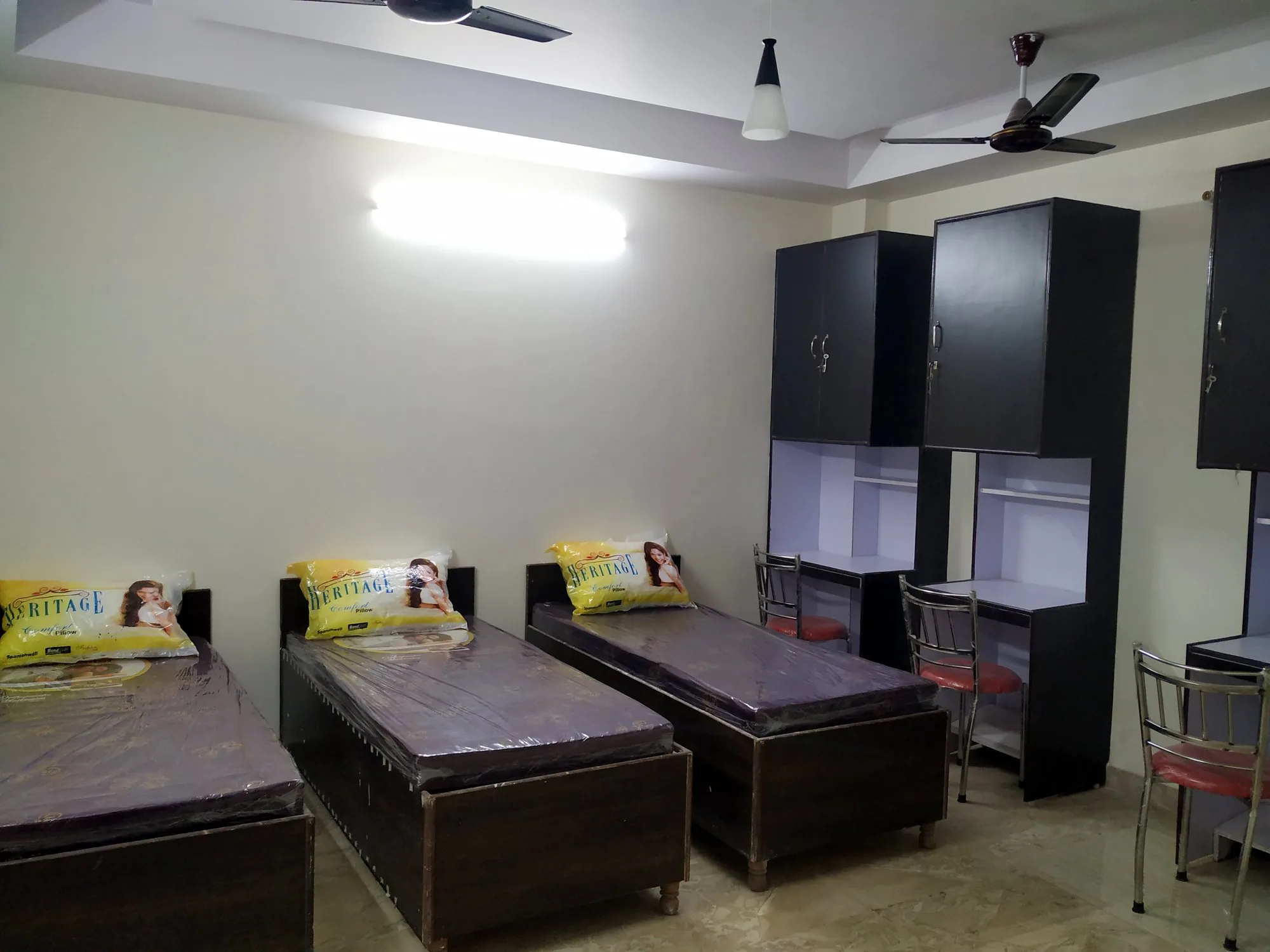 Furnished 3-sharing PG room at New Greenhigh Homes